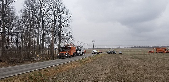 Tree trimmers for Bartholomew County REMC knocked down a tree Tuesday, Dec. 4th into power lines at County Road 500N and 1000E in Hope, creating a power outage that affected Schaefer Lake and other residents to the east. Photos courtesy of Michael Dean.