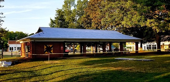 Amish Metal Roofers from Bloomington have been working to replace the roofs on the buildings on the Hope Town Square. Photos by Michael Dean.