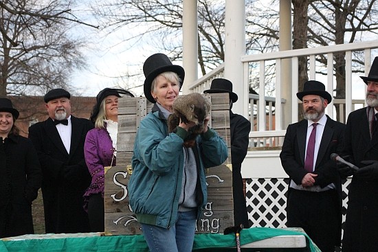 Grubby the Groundhog, from Utopia Wildlife Rehabilitators, saw her shadow on Sunday, Feb. 2nd in a ceremony on the Hope Town Square, forecasting six more weeks of winter. Photos by Trinity Whitted.
