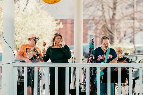 Dirty Laundry performs on the bandstand at Total Eclipse of the Hope on the Hope Town Square April 8, 2024. Photo credit: Main Street of Hope.