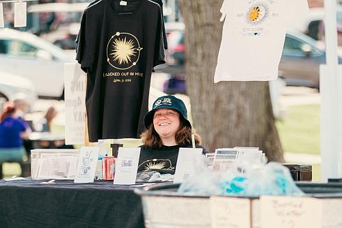 One of several booths set up around the Hope Town Square for the Total Eclipse of the Hope event that offered all types of eclipse-themed items for sale April 8, 2024. Photo credit: Main Street of Hope.