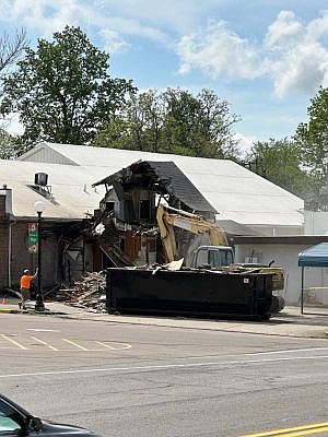 Demolition of the "Eat" building located on the Hope Town Square behind Ah-Ha Cafe on April 30, 2024. Photo credit: Jessica Deckard, submitted.