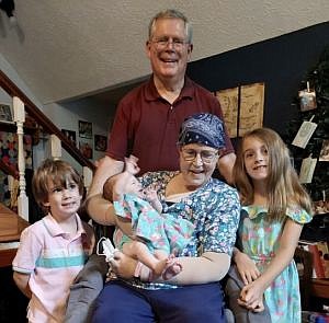 John and Candy with grandchildren (left to right) Franklin, Dottie Mae, and Melanie. Photo credit: Courtesy of Larry Perkinson.