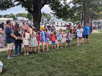 Crowds gather on the Town Square during the return of Hope's Old-Fashioned Independence Day celebration, hosted by the Yellow Trail Museum, on Friday, June 28, 2024, in downtown Hope, Ind. Photo credit: Susan Thayer-Fye.