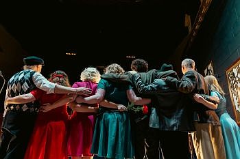 Members of the Passion for Acting Theatre Company take a bow following a performance of “It’s a Wonderful Life: A Live Radio Play at the historic Crump Theatre in downtown Columbus in November 2024. Photo credit: Connie K-B/Kathryn Baylor Photography.