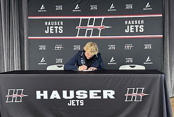 Corbin Beverly signs with Ozark Christian College on Tuesday, April 29 at Hauser Auditorium. Photo credit: Kyle Shipp.