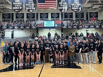 The Girls’ Basketball teams hosted 1A number 3 Trinity Lutheran on Saturday, January 10, 2026, to help celebrate the fight against cancer. Former teacher Todd Grimes and family were recognized as Mr. Grimes continues his fight against pancreatic cancer. Photo credit: Courtesy of the Hauser Athletics Booster Club.