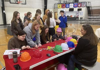 Mary Schwartzkopf, Grainger, interacts with students during the Beyond Hope Career Expo on February 6, 2026, at Hauser Jr./Sr. High School in Hope, Ind. Photo credit: Bradley Dickens, submitted.